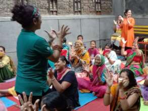 Dr. Harjeet conducting Yoga & Meditation