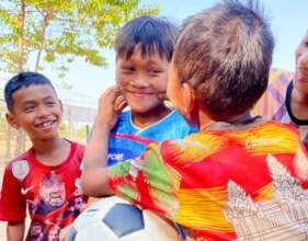 Kids playing sports in Cambodia