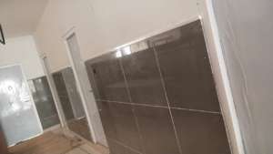 Wall tiling completed