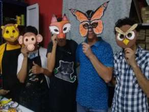 artists showing off animal masks