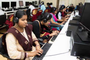 Visually Impaired students learning computer usage