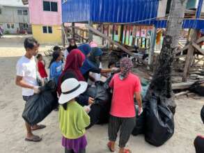 Villagers joining the clean-up