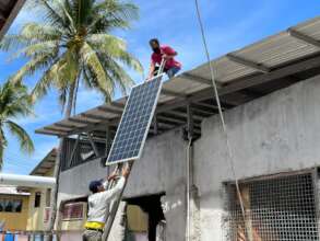 Installing solar power panels at MPRC