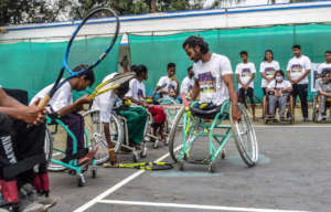 Instuctor Madhusudhan teaching the Racquet Holding