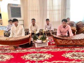 Trained youths play traditional music at ceremony