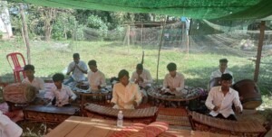 Trained youths are performing the Pinpeat music