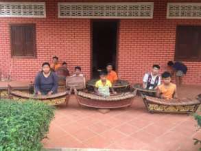Nith with classmates playing Roneat Aek