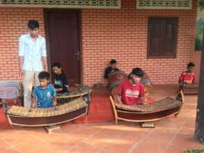 Chin Sok is providing the traditional music