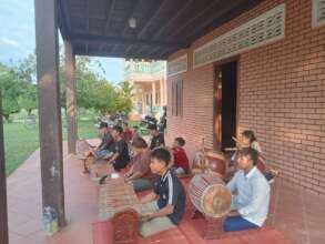 Youth are practicing music in SCC school