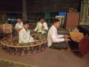 Veasna is playing the music at another ceremony