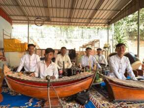 Veasna is playing Khmer traditional music