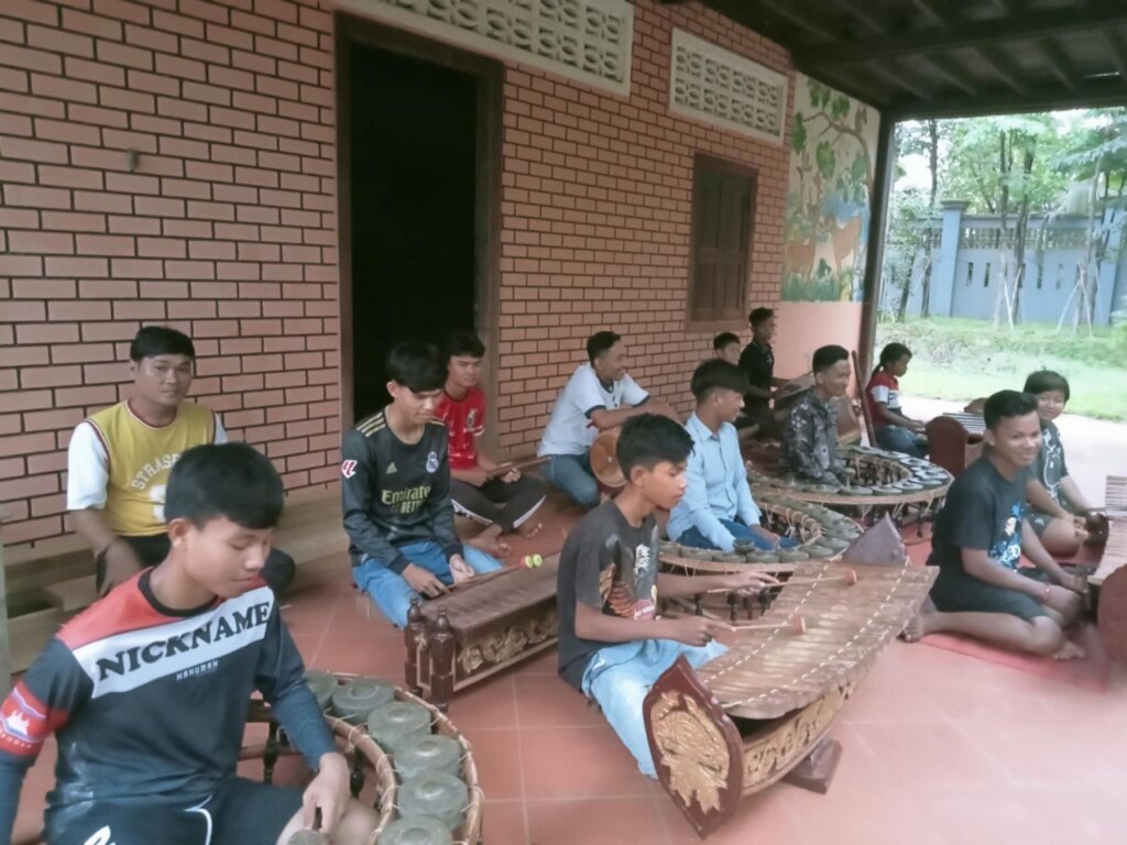 Tola practices the music at SCC