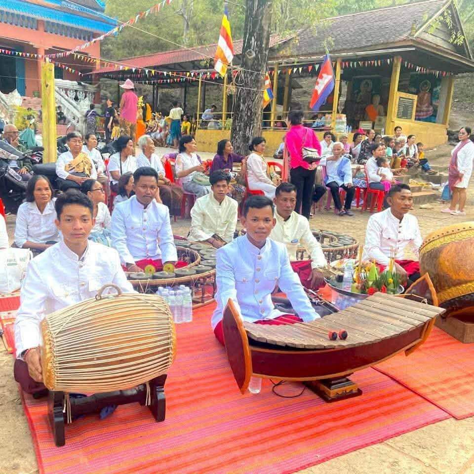 Noy performs traditional Khmer music in a ceremony