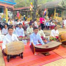 Noy performs traditional Khmer music in a ceremony