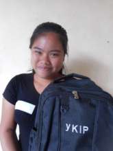 Sari with the new bag and school supplies