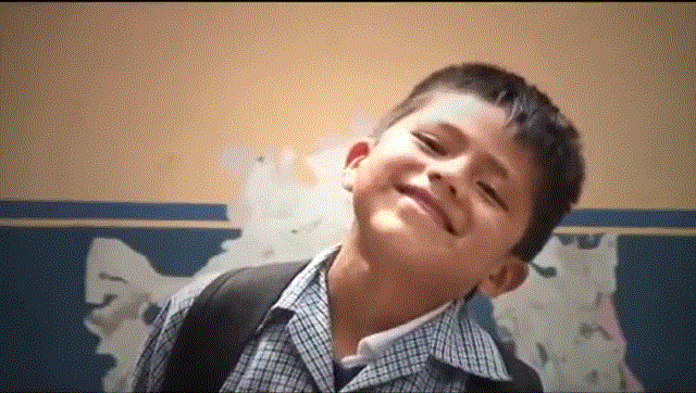 He is so happy to now be in school!