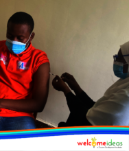 A student gets his first Pfizer shot