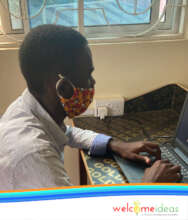 A student practices typing in IT class