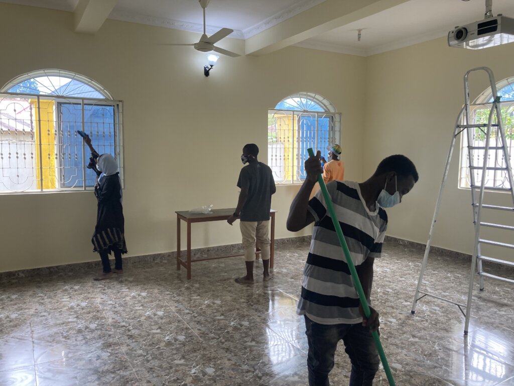 Students help cleanup after school painting