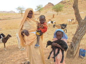 A family in Darfur with their prized possesion