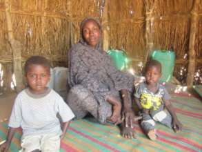 A family who will benefit from a goat loan.