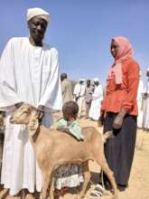 Nadia with her child and Goat