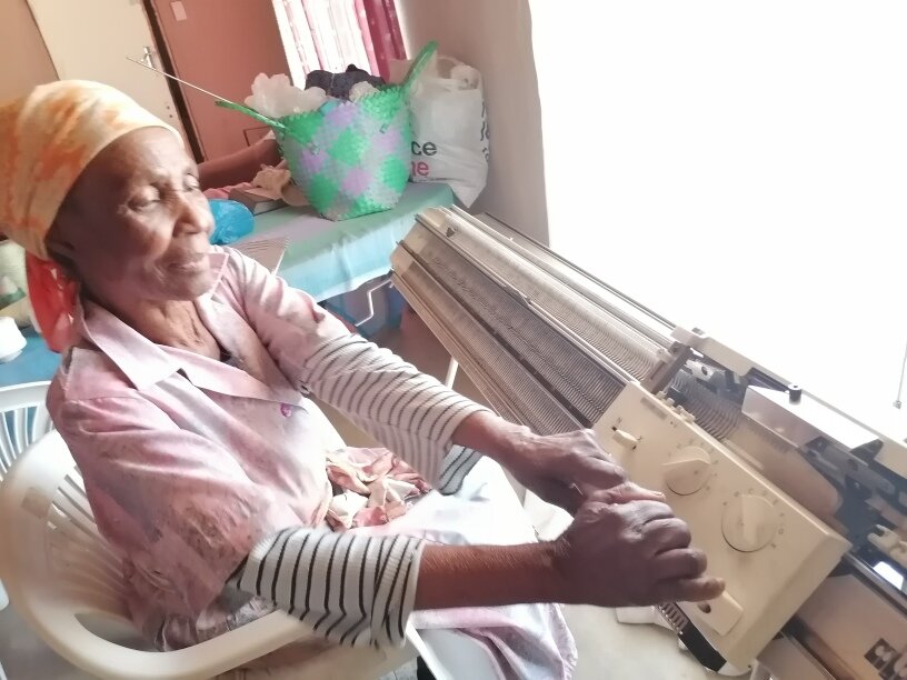 Betty at her knitting machine