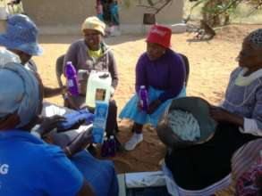 Mmwangwana group members about to make floorpolish
