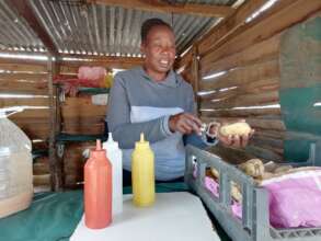 Florence Lowele of Rekakgona sells chips and kota