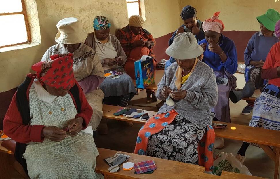 Group members doing Patchwork
