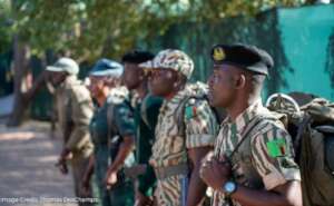 Rangers prepare for patrol at Musa Camp, Nkala Gam