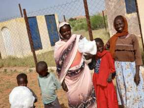 A Family receives Mosquito Nets