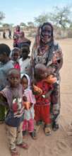 Madiha and her Children Receive Kids Kitchen Kits
