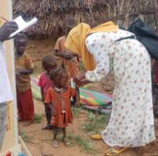 Children are measured to monitor malnutrition