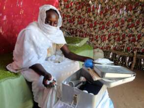 A trained midwife able to help Fatima