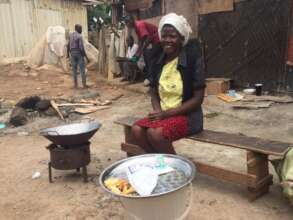 Deborah frying up some cassava!