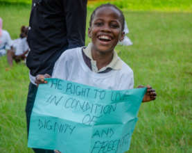 A child excited when she learnt about her rights