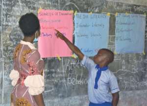 Sulaimon explaining sources of information