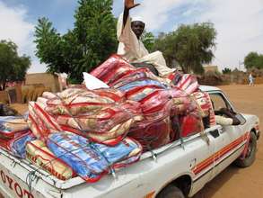 A blanket delivery arrives in Darfur