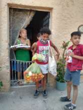 Hand-out of food and greens