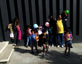 Coordinator Carlos with the happy and active kids