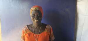 Smiling from the ravages of conflict with hope