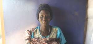 A woman that has impressed sewing in the camp
