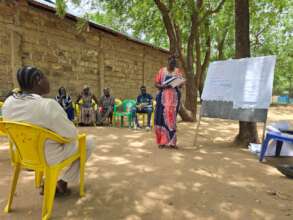 Refugee apprentice facilitator leading a session