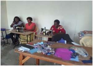 Learning to make re-usable sanitary towels.