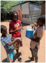 Homemade liquid soap made by women of sewing group