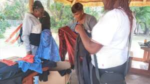 Participants receiving clothes