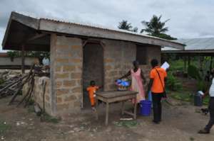 Community members serving Nadit's school