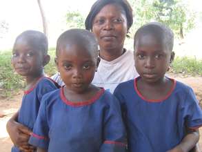 Martha with 3 of her adopted children.