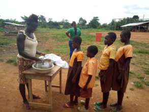 Charity sells rice at the school